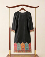 Back view of premium black silk kurta featuring intricate Kanni embroidery, detailed Zari work on borders, displayed on an elegant wooden and gold stand against a clean white background; showcasing rich multicolored traditional motifs and fine craftsmanship.