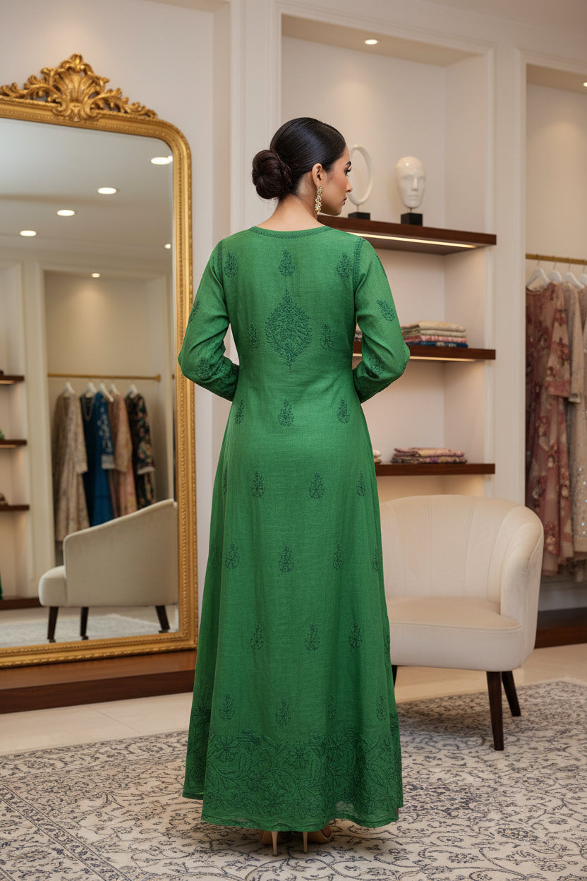 Rear view of the Bottle green colour hand embroidered A line dress 53" long.