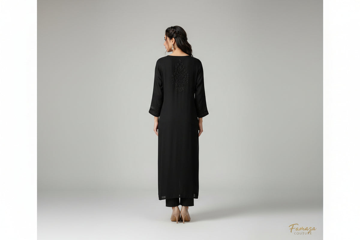 Rear view of this Long jet black kurti with floral embroidery.