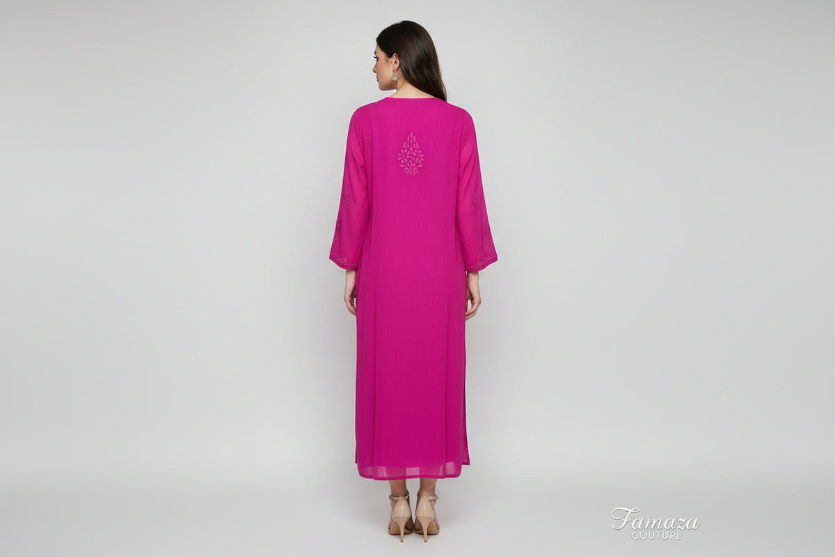 Rear view of this Long magenta kurti with floral embroidery.