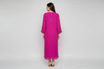 Rear view of this Long magenta kurti with floral embroidery.