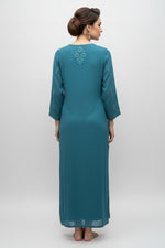 Rear view of this Long teal kurti with floral embroidery.