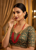 Red braided mala with gold accents and matching earrings by famaza couture 