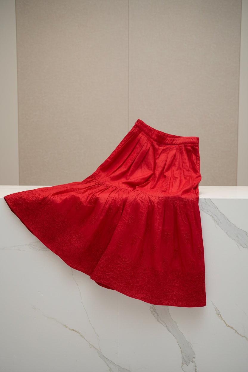 Red cotton gharara with bakhiya hand embroidery on the bottom falre. 