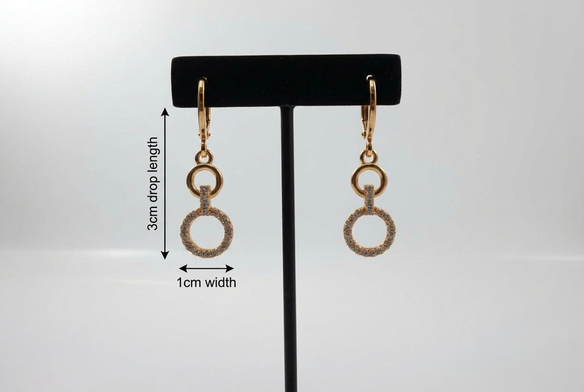 Rose gold polish American Diamond earrings 3cm drop length with 1cm width is shown in the image.