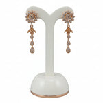 Rose gold polish American Diamond earrings with an intricate multi-petal floral design and tiered white stone charms.