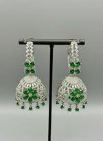 Round bali on top and jhumka in the bottom style earrings with silver AD stones and bottle green stones in flowers. Party wear earrings. 