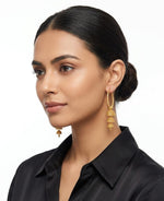 Posh model wearing Royal Heritage Gold Triple Layer Jhumka Bali earrings with a 7.5cm drop.