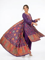 Model wearing a deep royal purple Kanni embroidered silk kurta set with a matching intricately patterned dupatta, displayed against a pure white background.