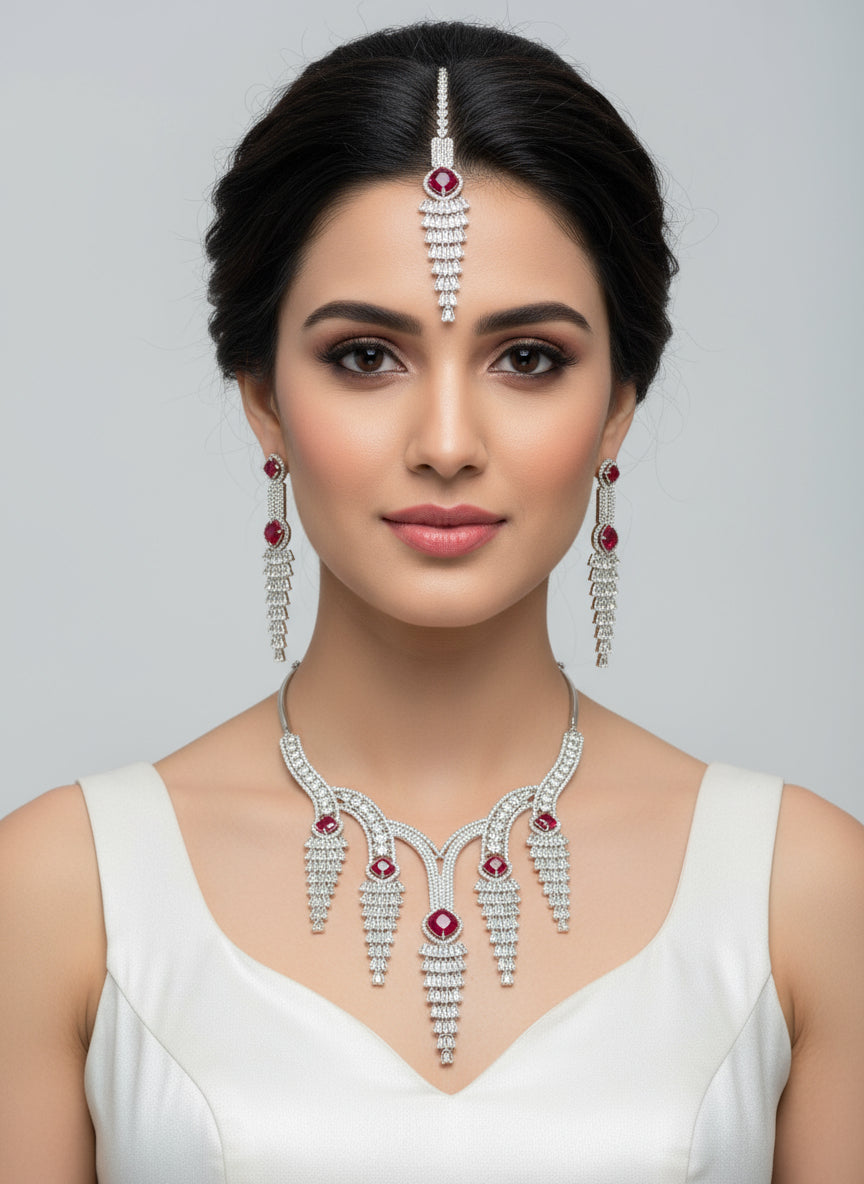 white American diamonds with Red ruby imitation drop necklace,earrings and maang tikka Famaza Couture
