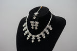 Silver jewellery set with choker necklace, earrings and maang tikka 