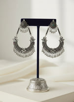 Silver ornate earring by famaza couture 
