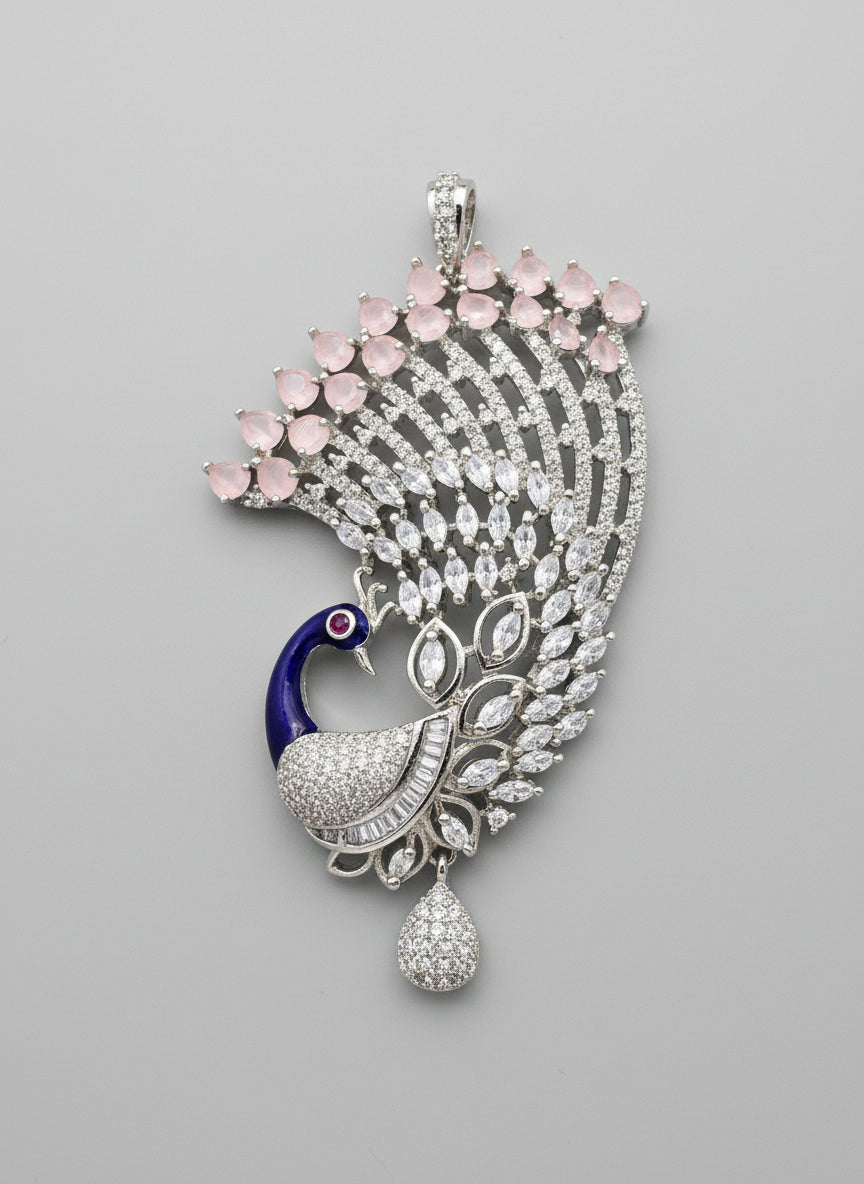 Silver plated peacock-shaped pendant in Silver chain The pendant is detailed with blue enamel and has sparkling white and pink AD crystal embellishments.