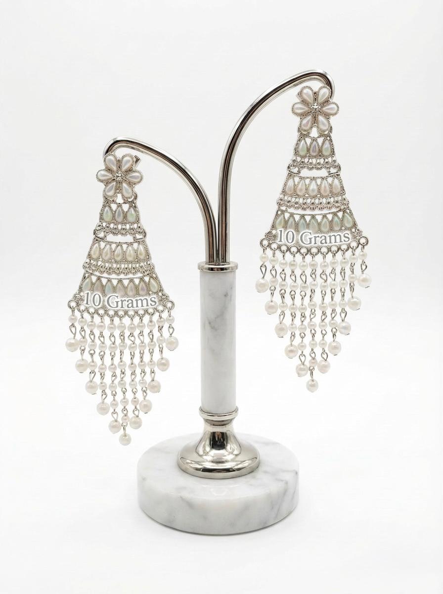 Sophisticated silver-toned tiered earrings with a delicate fringe of white pearl beads for festive occasions.