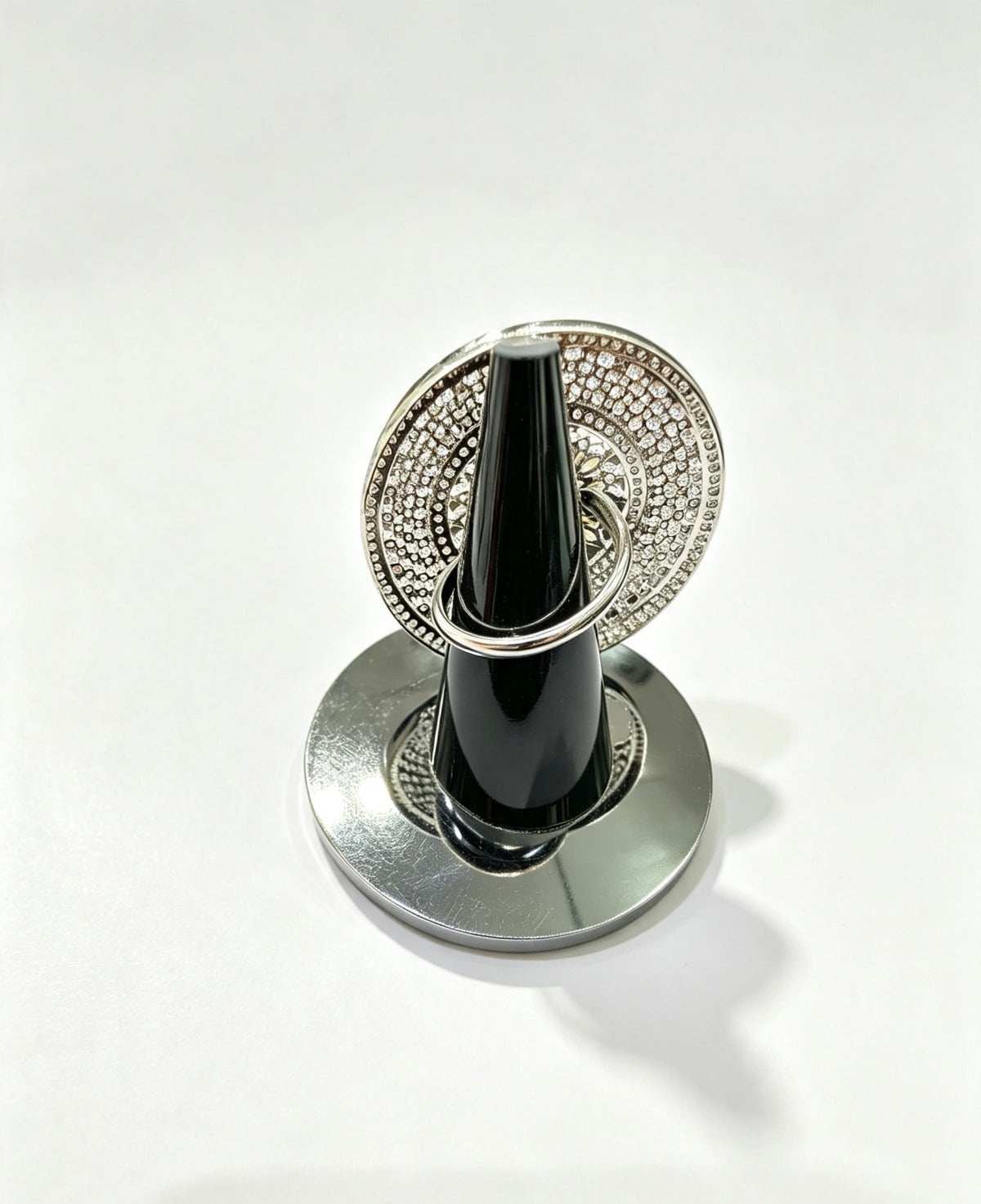 Sunflower Splendor Diamond Statement Ring by Famaza Couture — rear view showing band and setting, displayed on stand against clean white background, luxury floral halo cocktail ring.