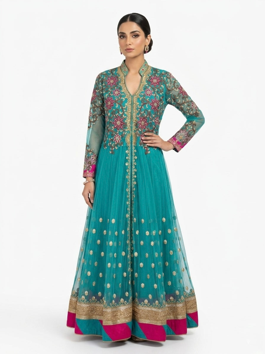 Teal Anarkali suit with floral embroidery on a white background