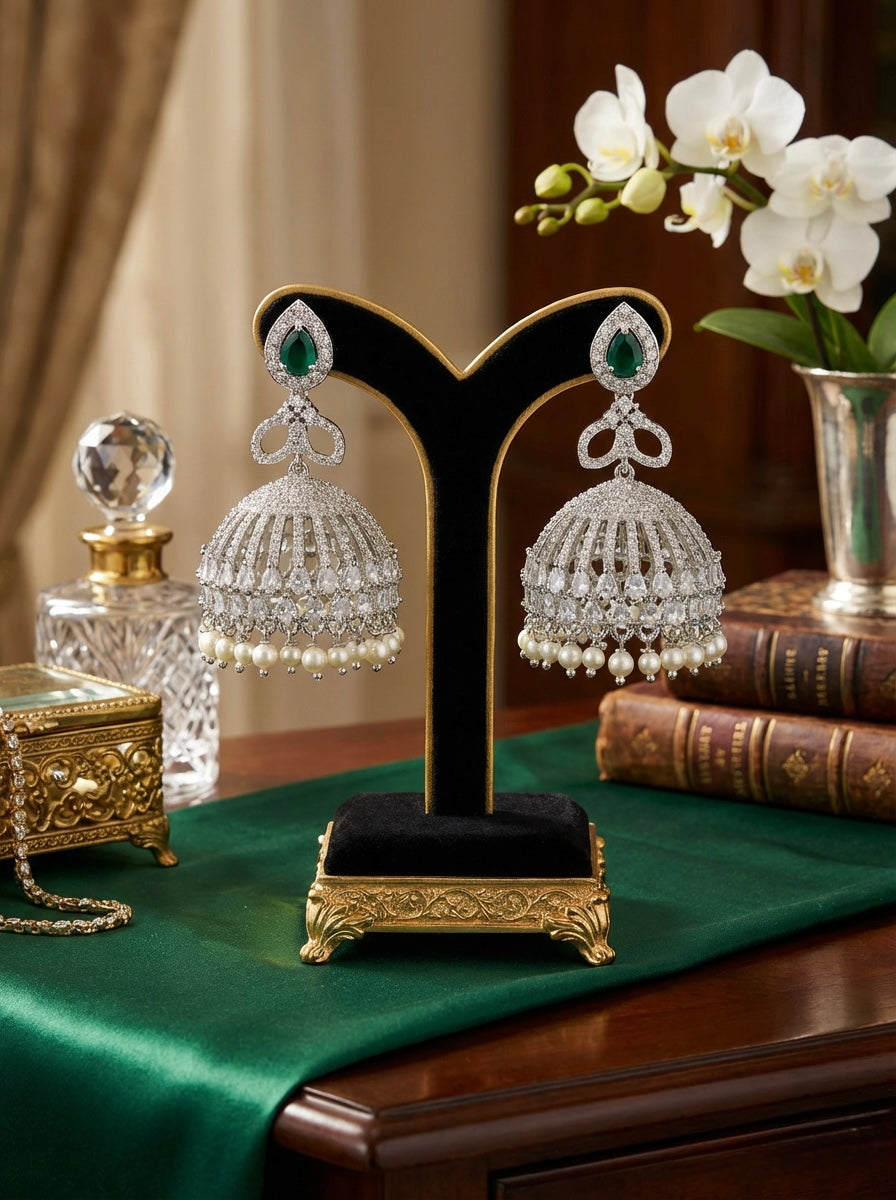 The American Diamond earrings white stone with nano pearls bottom hangings. 
