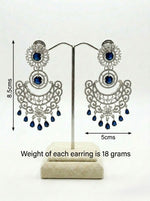 The American diamond earrings with white and navy blue cubic zirconia stones. 