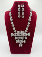 The American diamonds with purple cubic zirconia centre stones hasli necklace and earrings jewellery set.