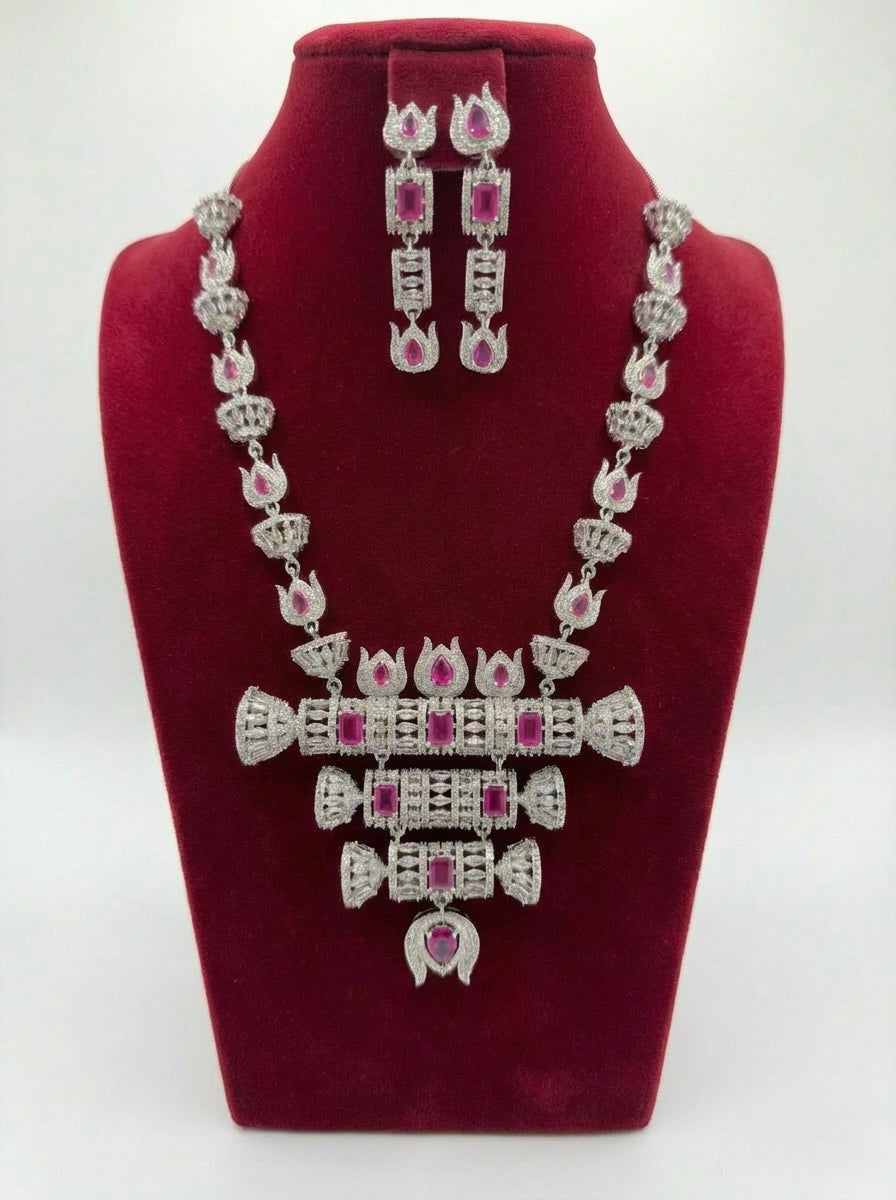 The American diamonds with ruby pink cubic zirconia centre stones hasli necklace and earrings jewellery set