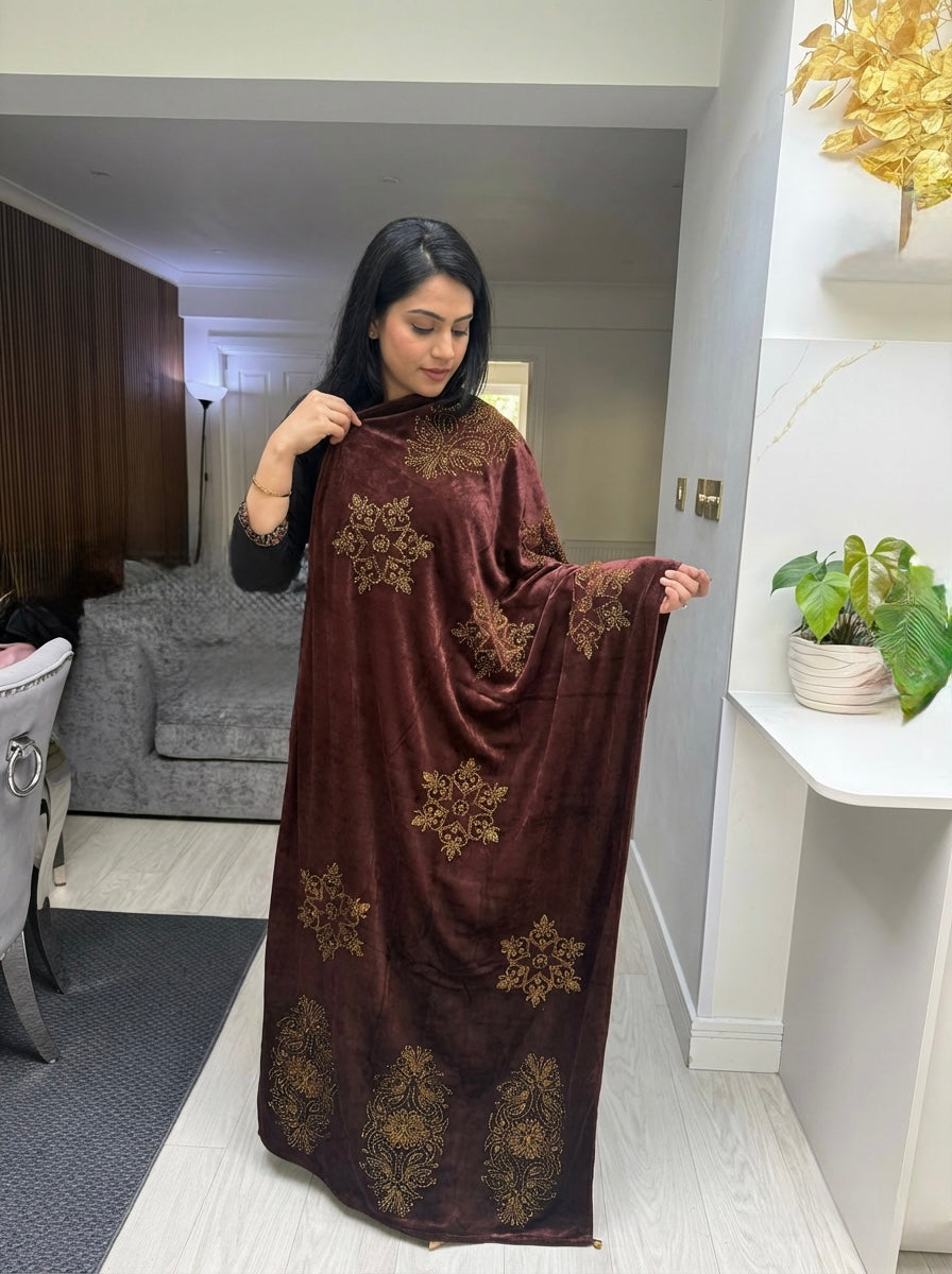 The Brown colourvelvet stole with golden stones work all over the stole.