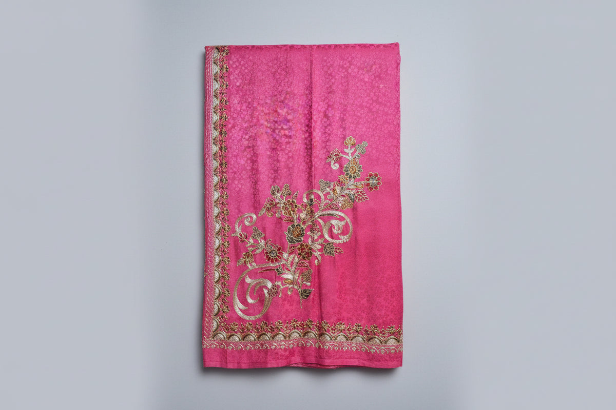 The Watermelon pink colour Kashmiri aari embroidery shawl with tassels on both ends. 
