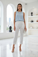 The White stretchable cotton hand embroidered chikankari pants with pockets 