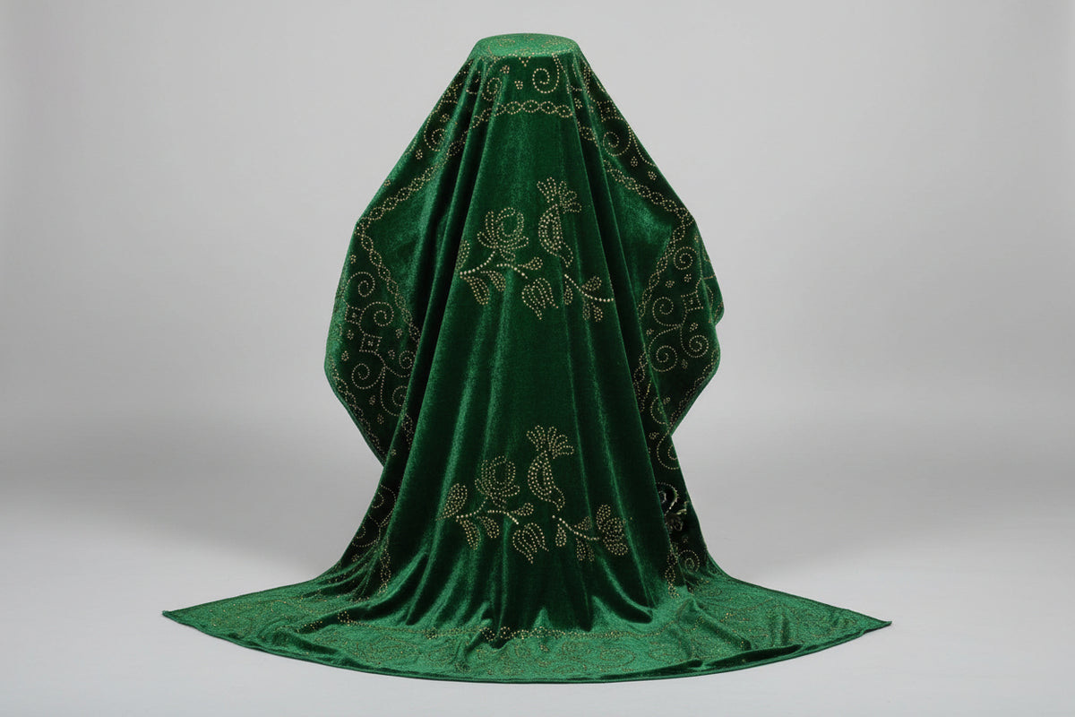 The green velvet stole with Swarovski work and floral patterns.
