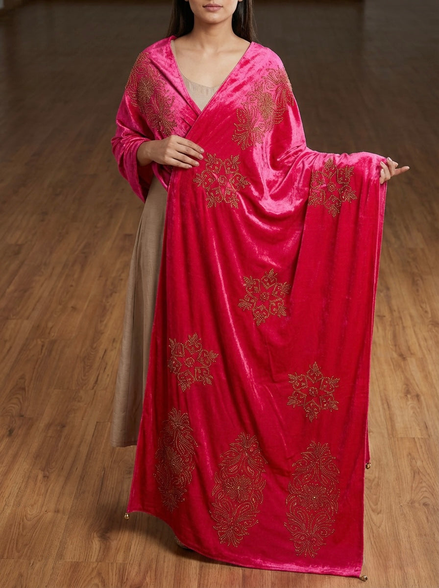 The hot pink colourvelvet stole with golden stones work all over the stole.