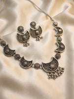 The oxidised chocker necklace and stud earrings jewellery set. 