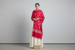 The pink Kashmiri embroidered pashmina scarf with a floral pattern and tassels along the edges.