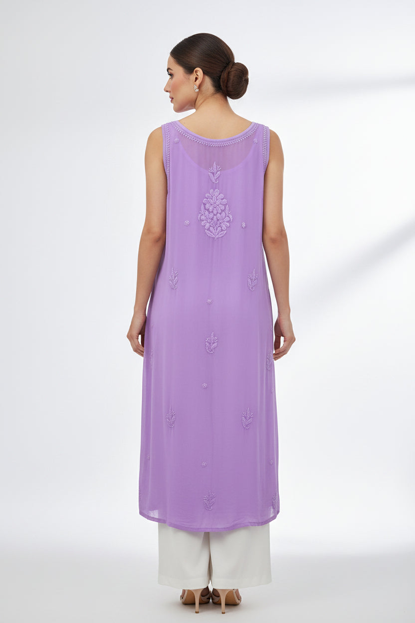 The rear view of a lavender purple sleeveless viscose fabric kurti with hand embroidery on the rear view of the kurti 