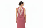 The rear view of the pink sleeveless kurti is displayed on a dummy.