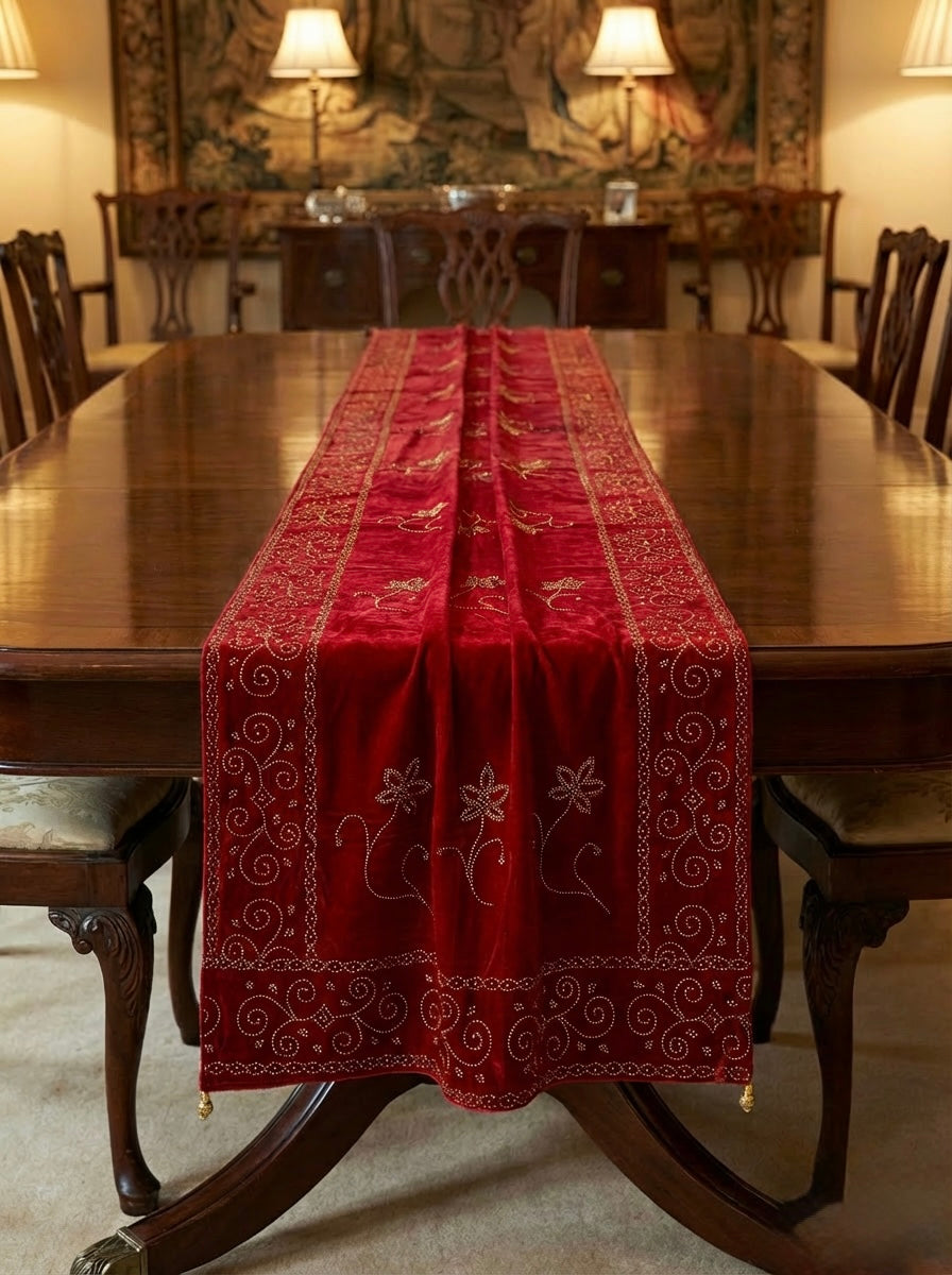 The red colourvelvet stole with golden stones work all over the stole.