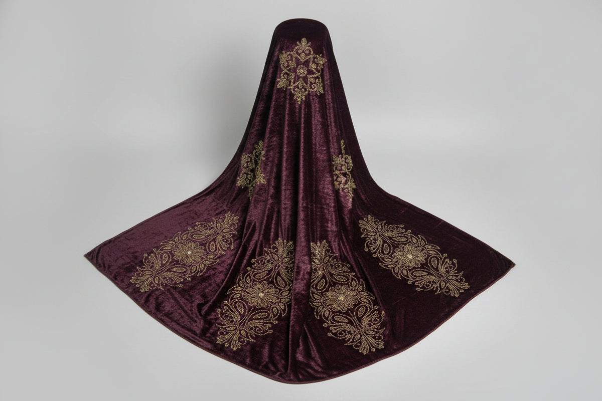 The violet purple velvet stole with Swarovski crystal embellishments and intricate floral patterns.