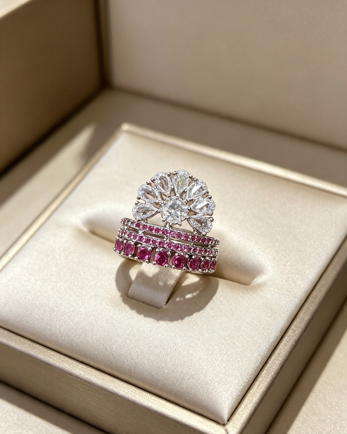 Fan Halo Tiered Ring with white crystal fan halo and silver & fuchsia pink multi-tiered band, luxury designer jewelry presented in elegant cream satin-lined gift box.