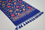  blue colour pashmina scarf with Kashmiri embroidery in a floral pattern, featuring tassels on the ends.