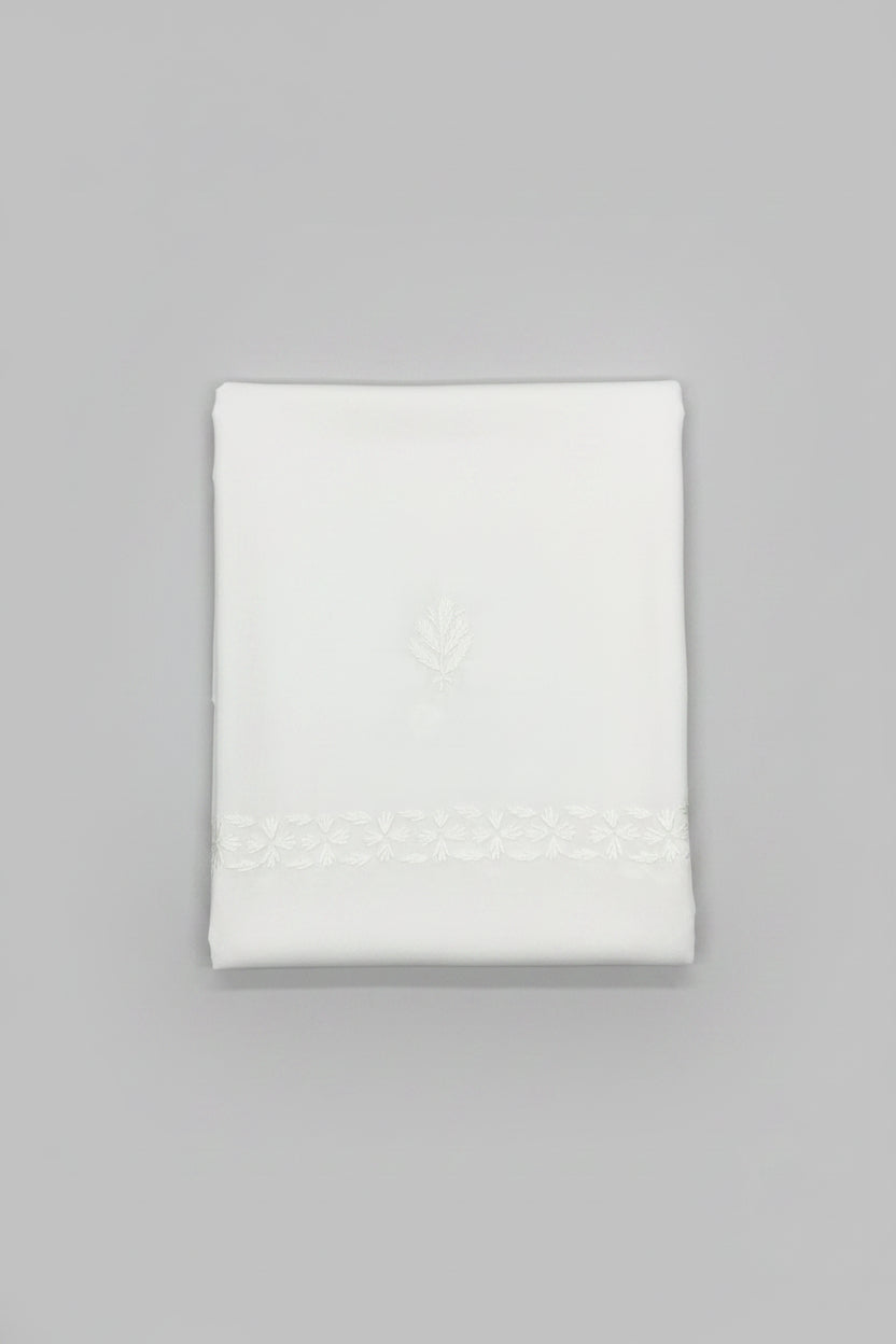 White lawn fabric shawl with white silk thread hand embroidery on the both side borders and small flowers on all over the shawl. 