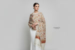 White pashmina scarf with Kashmiri embroidery in a floral pattern, featuring tassels on the ends.