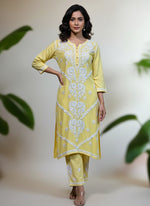 Yellow colour modal fabric long kurti and trousers with floral hand embroidery on kurti and trousers. 