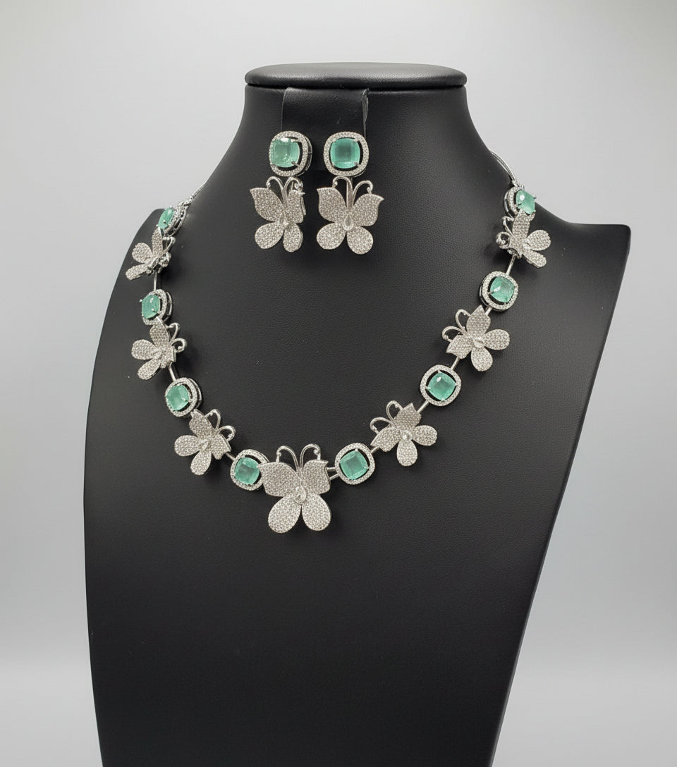 a jewellery set of white Nano American diamonds and turquoise central stone earrings by famaza couture 