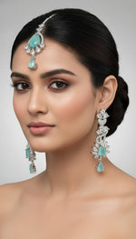 american diamonds with turquoise centre stones earrings and maang tikka by famaza couture 