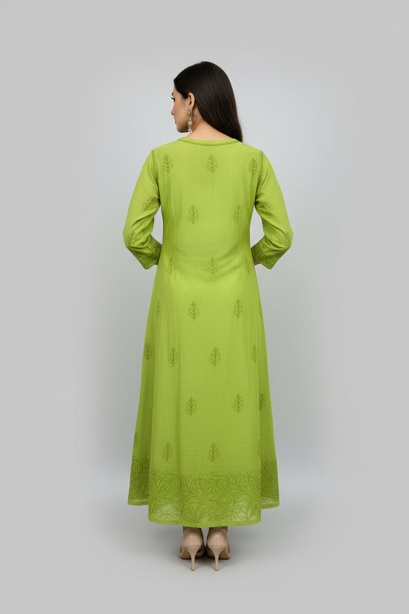 apple green A line dress with hand embroidered chikankari work is displayed.