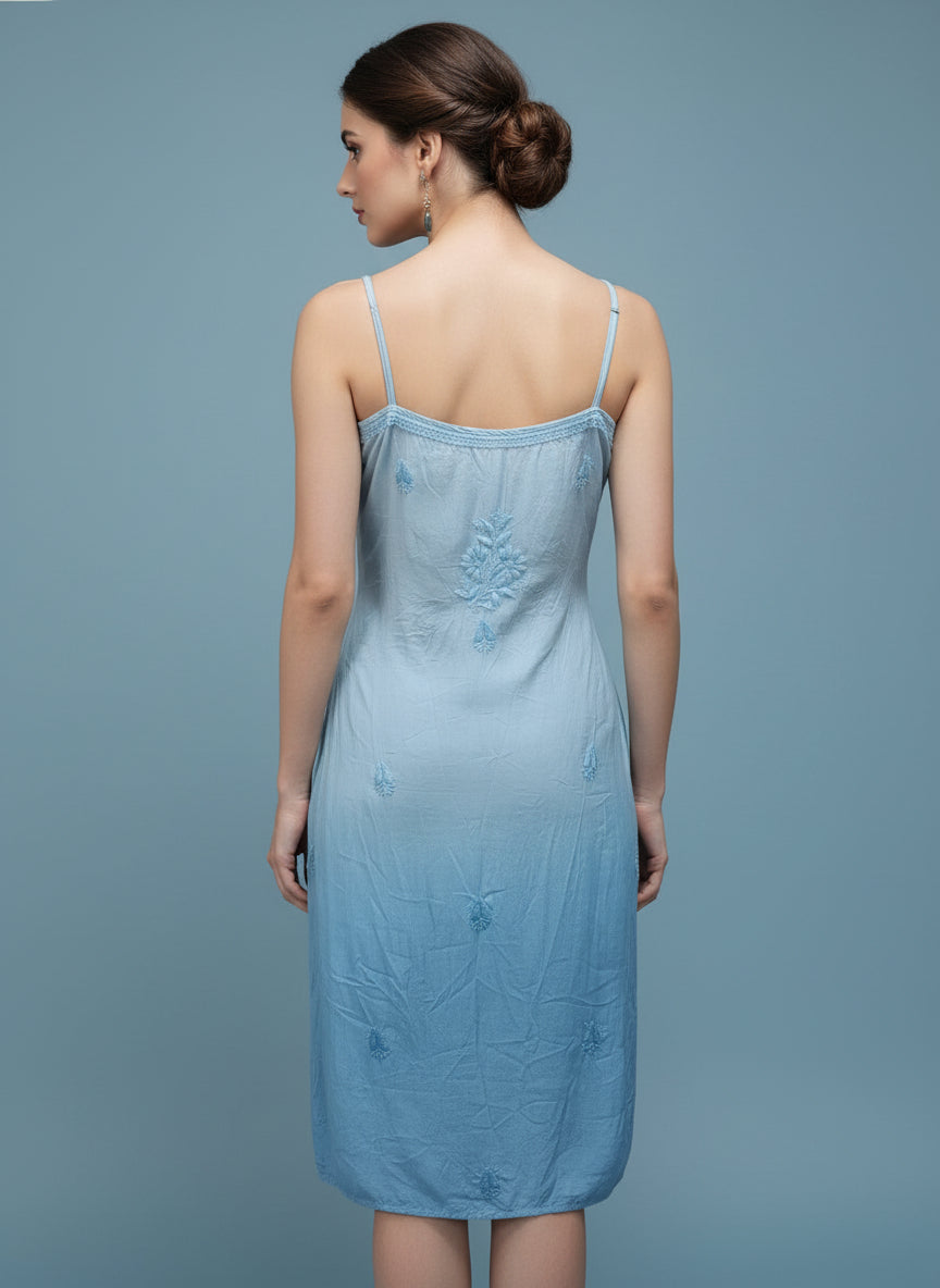 back side of sky blue Chikankari muslin fabric noodle dress with hand embroidery by famaza couture 