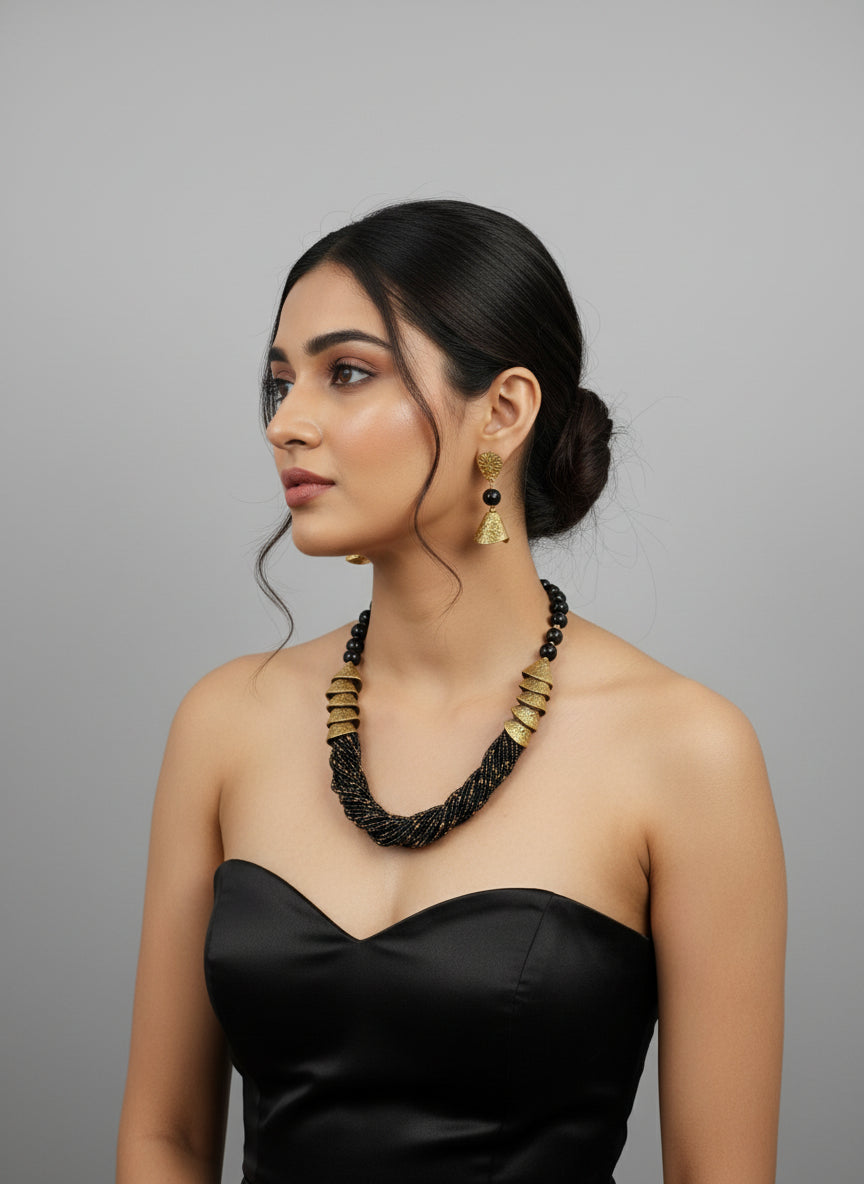 black braided necklace jewellery set with gold accents and matching earrings by famaza couture 
