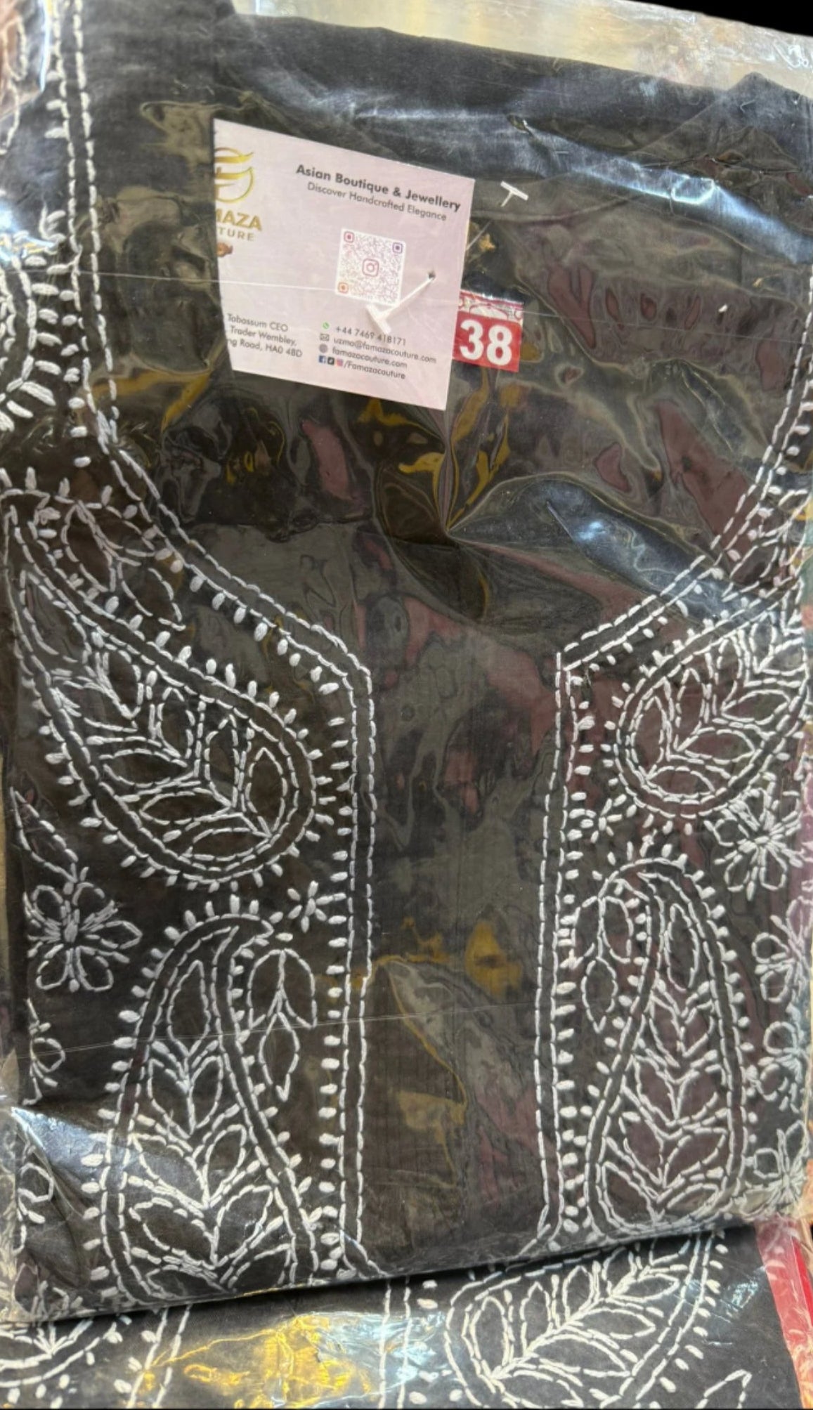Black chikankari kurti neck close up 