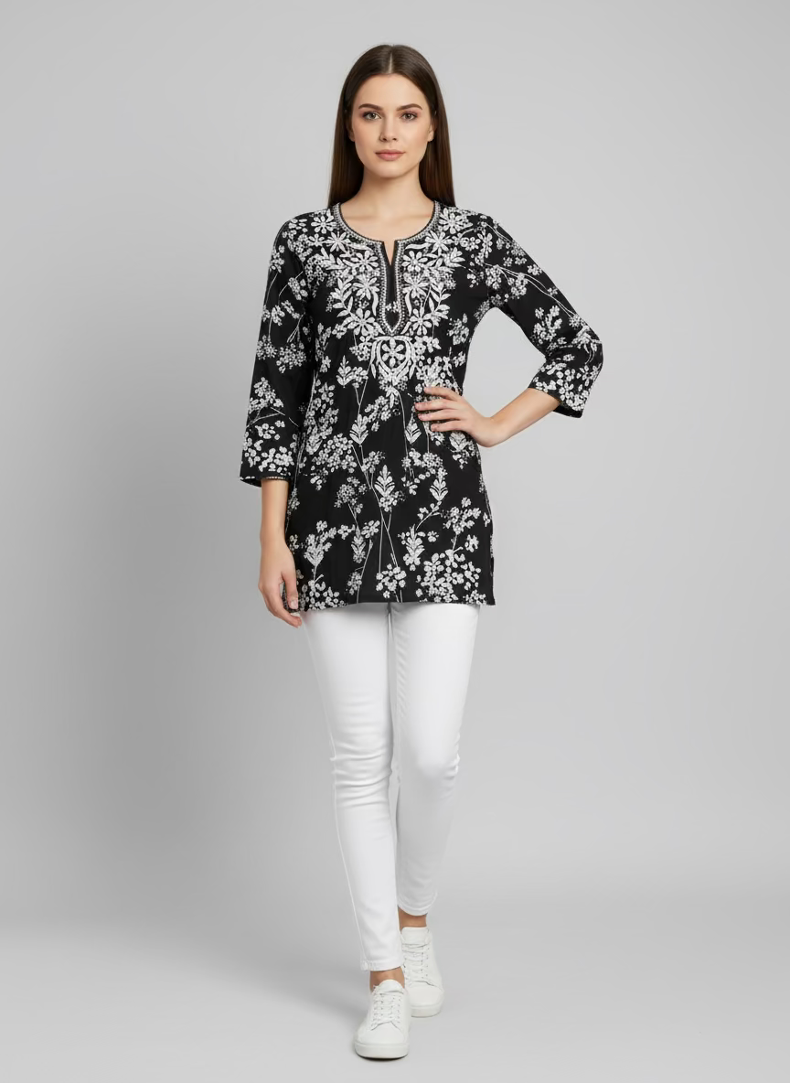 black colour machine embroidered printed short length kurti with white jeans by famaza couture 