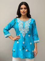 blue short kurti in tie & dye style with white machine embroidery by famaza couture 
