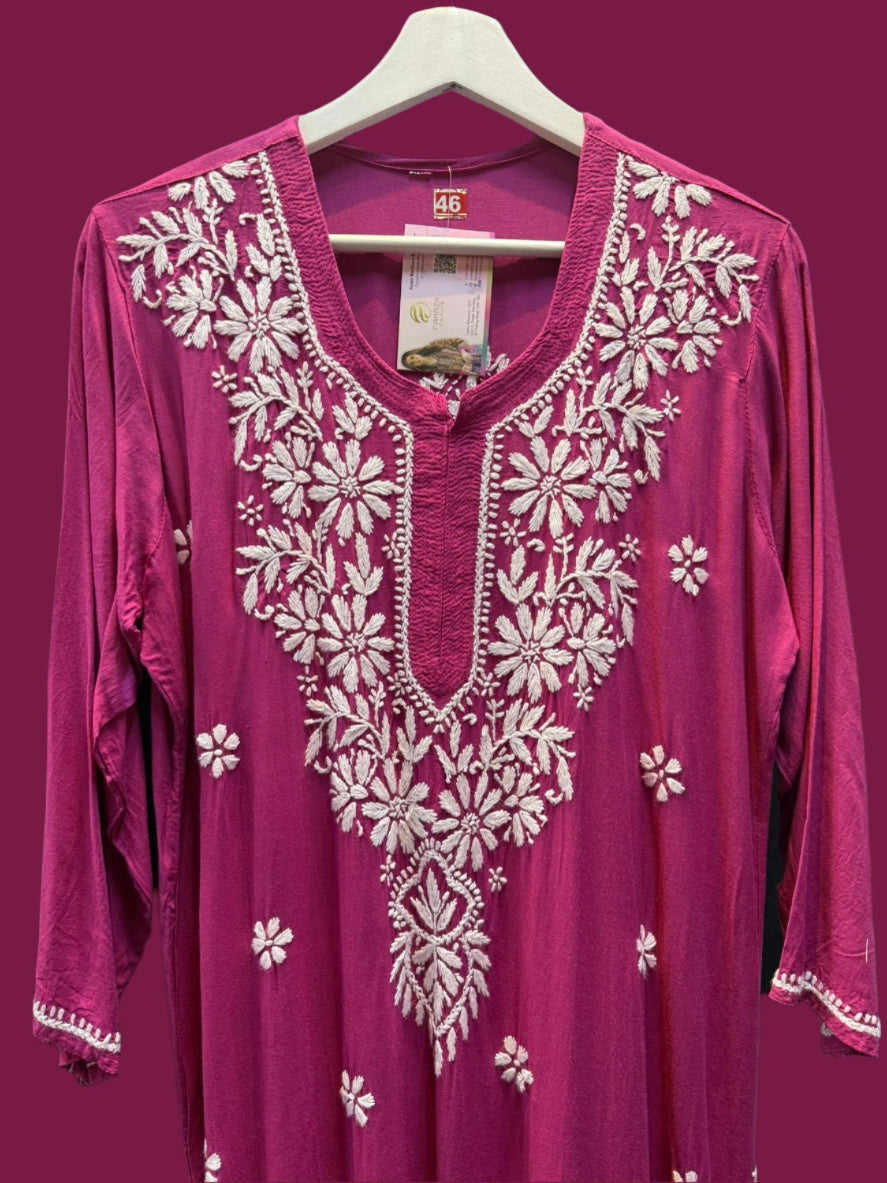 close up of chikankari kurti modal ghass patti booti embroidery hot pink