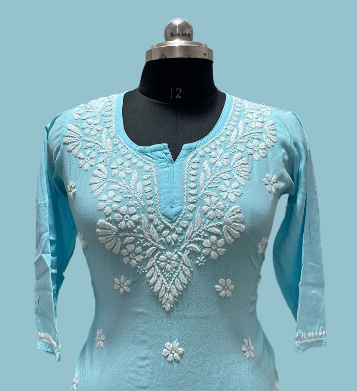 Close-up of Chikankari handwork on short kurti